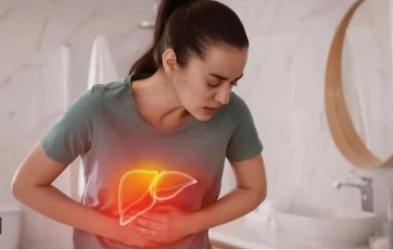 "Young woman with fatty liver due to occasional weekend drinking"